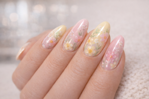 Pastel floral spring nails with hand painted flowers March Nail Trends at Blissful Beauty Nail Lounge San Diego