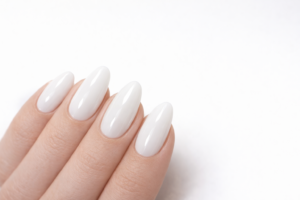 Minimal white almond nails with glossy finish March Nail Trends at Blissful Beauty Nail Lounge San Diego